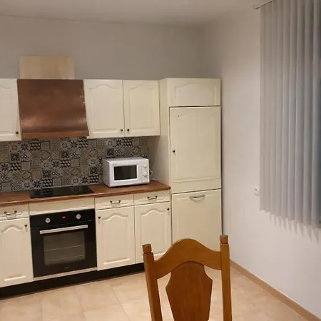 Holiday home Le Petit Merle -